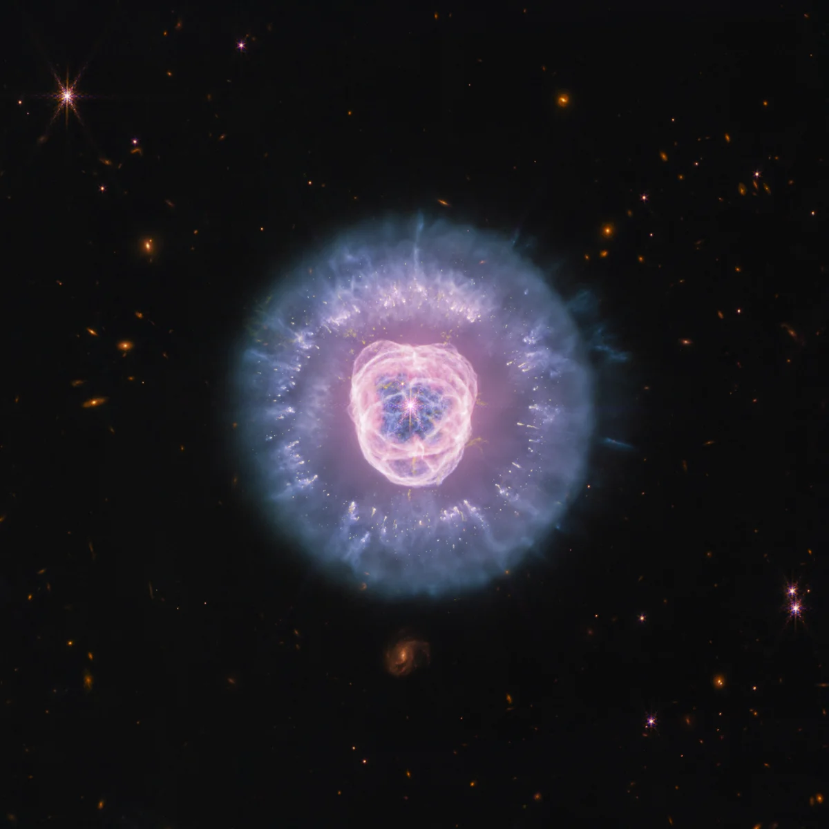 NGC 2392: зірка, що вмирає, під оком JWST